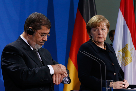 Angela Merkel und Mohammed Mursi