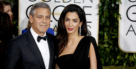 George und Amal Clooney auf dem roten Teppich