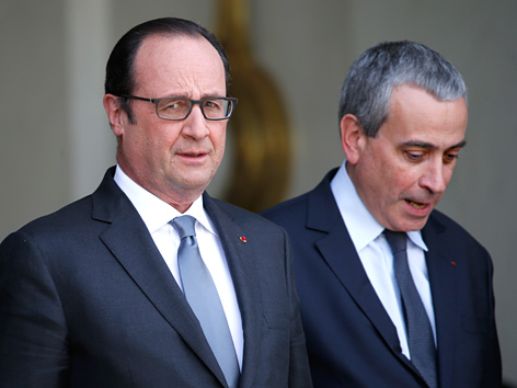 Frankreichs Staatschef Francois Hollande und Diplomat Laurent Stefanini
