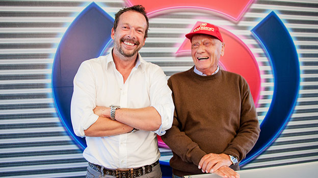 Robert Kratky und Niki Lauda lachen