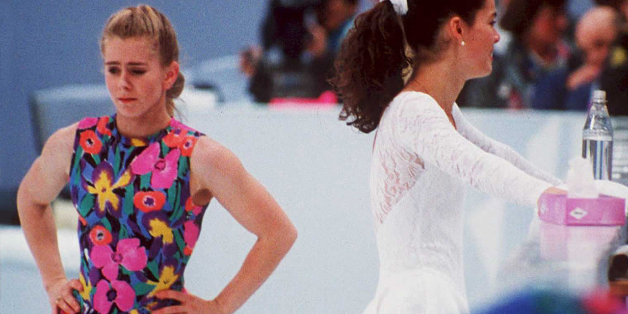 US figure skaters Tonya Harding (L) and Nancy Kerrigan avoid each other during a training session 17 February in Hamar, Norway, during the Winter Olympics.
