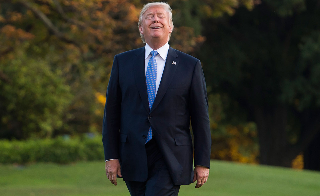 US President Donald Trump walks from Marine One after arriving on the South Lawn of the White House in Washington, DC, September 27, 2017