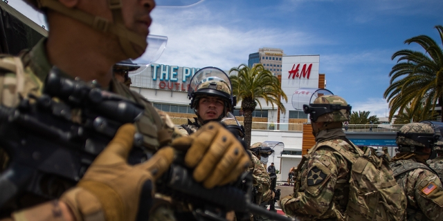 US National Guards are seen in front of a shopping mall in Downtown Long Beach, California on June 1, 2020
