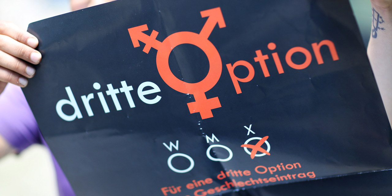 Plakat mit Intersex-Symbol und der Aufschrift "dritte Option"