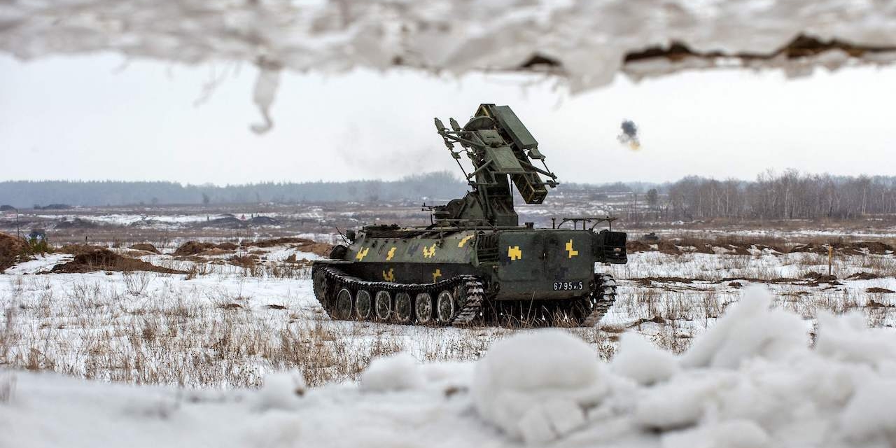 Ukrainian Military Forces servicemen use tanks, self-propelled guns and other armored vehicles to conduct live-fire exercises near the town of Chuguev, Kharkiv region on February 10, 2022