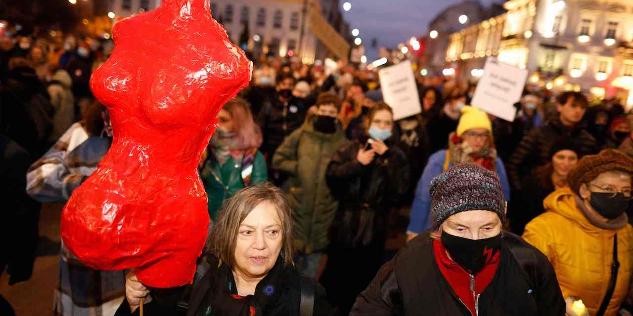 Protesters take part in a demonstration on November 6, 2021 in Warsaw, Poland, to mark the first anniversary of a Constitutional Court ruling that imposed a near-total ban on abortion