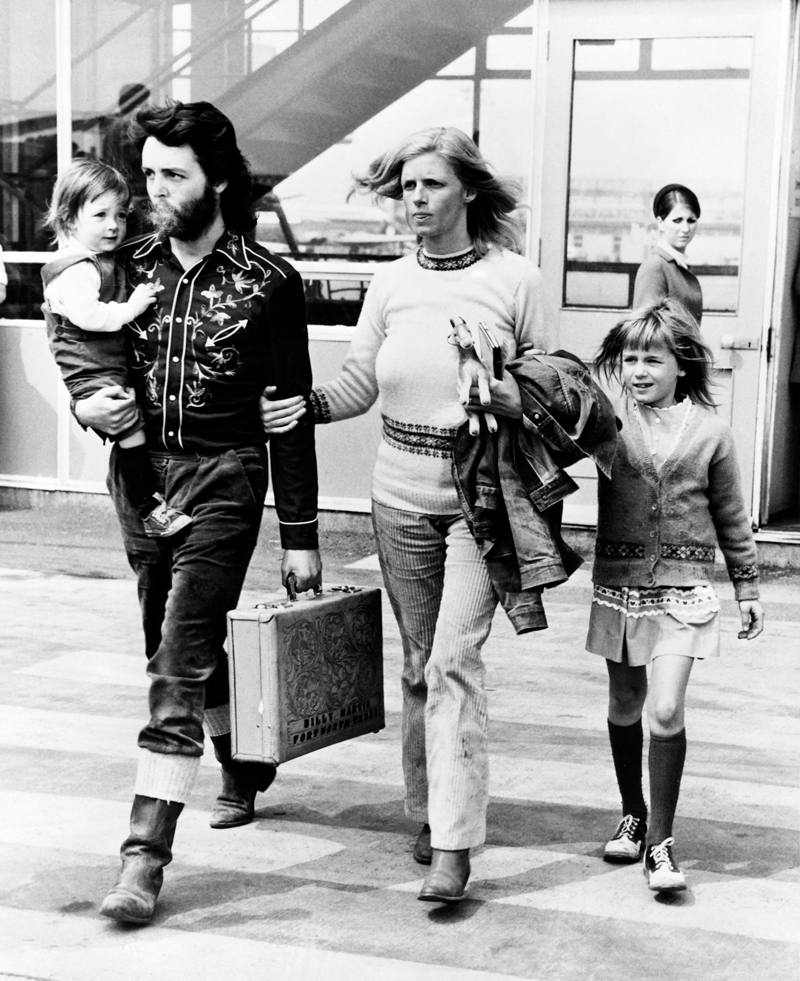 British singer Paul McCartney former member of The Beatles, accompanied by his wife Linda and their children are pictured on May 13, 1971 in London.