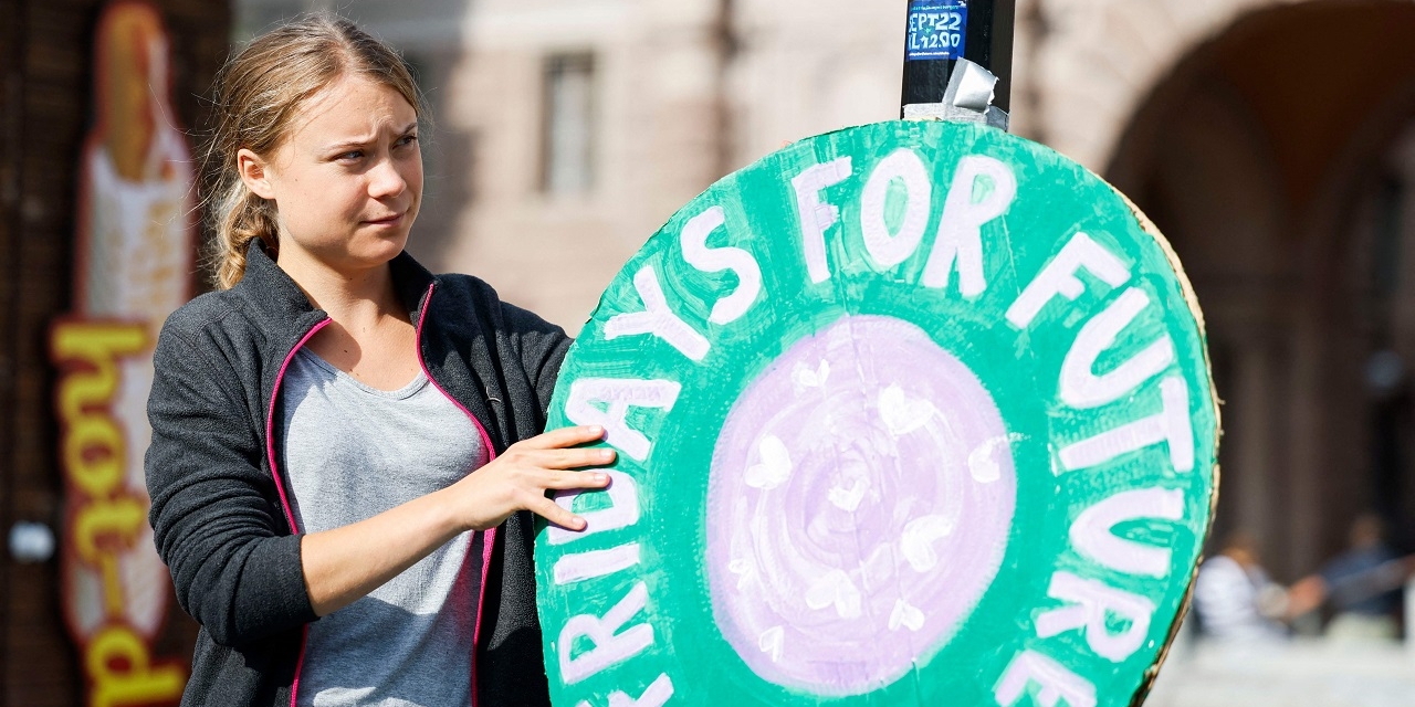Greta Thunberg holds a placard during a climate protest organized by the Fridays For Future network in Stockholm on September 22, 2023